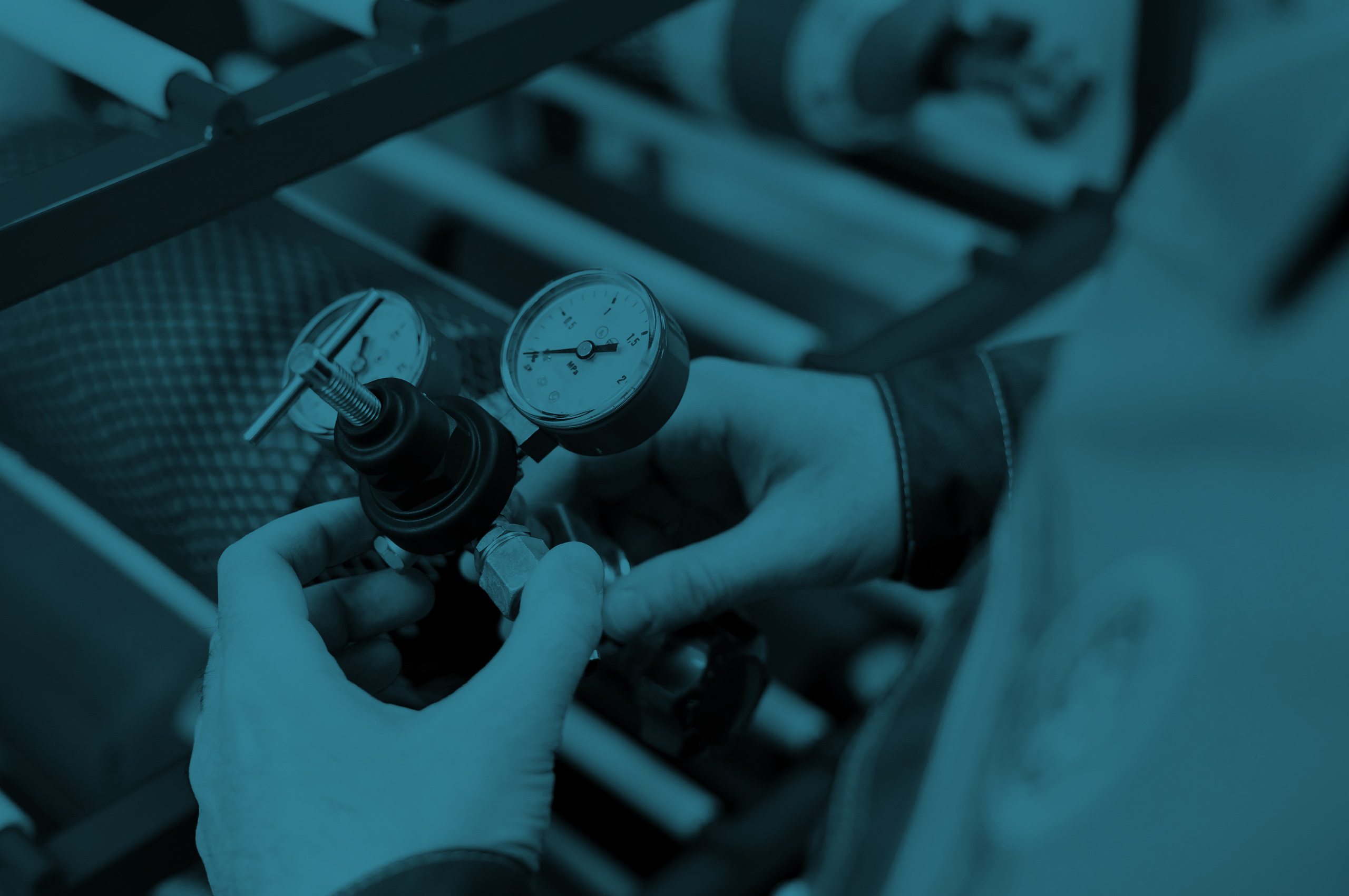 Maintenance worker prepping calibration gas cylinder