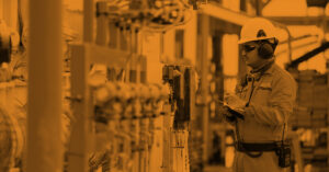 Operator recording operation of oil and gas process at oil and rig plant, offshore oil and gas industry, offshore oil and rig in the sea, operator monitor production process, routine daily record.