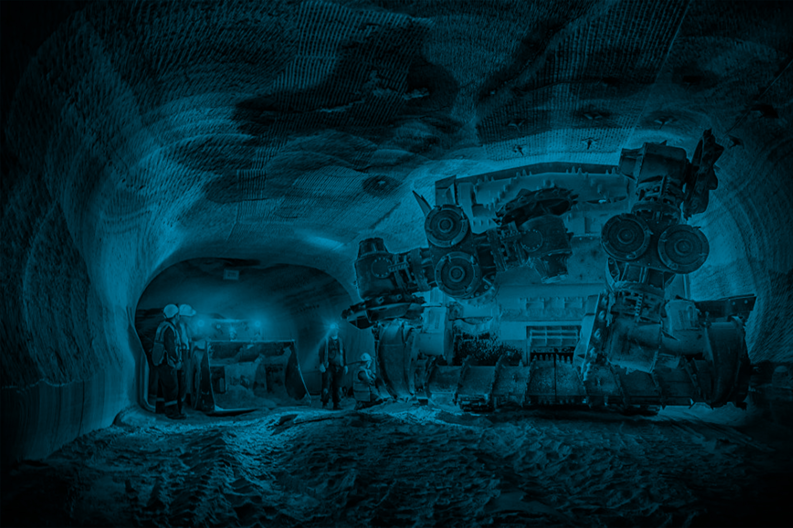 Mine personnel inspect progress in potash mine.