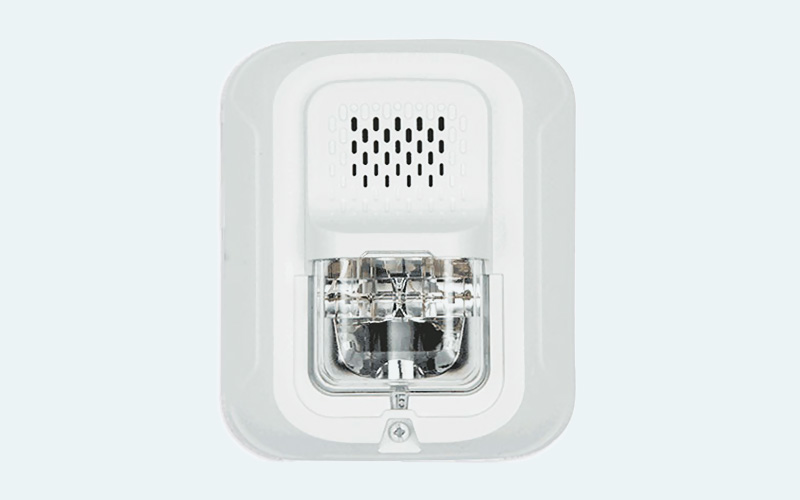 Photograph of P2WL-P fixed horn and strobe combo on white background, showing plug-in design