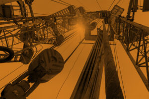 Oil and Gas Drilling Rig onshore dessert with dramatic cloudscape. Oil drilling rig operation on the oil platform in oil and gas industry.